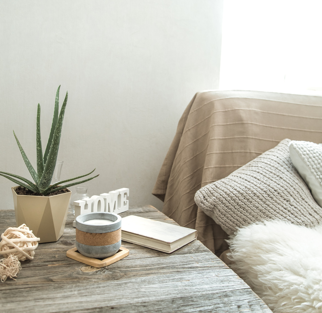 Home interior with decorative items on a wooden table.